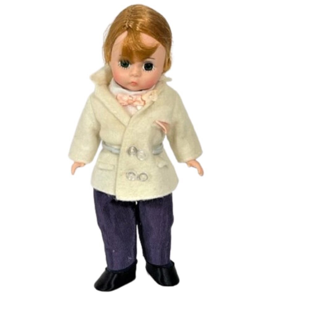 Madame Alexander restrung 8" Groom doll with stand.